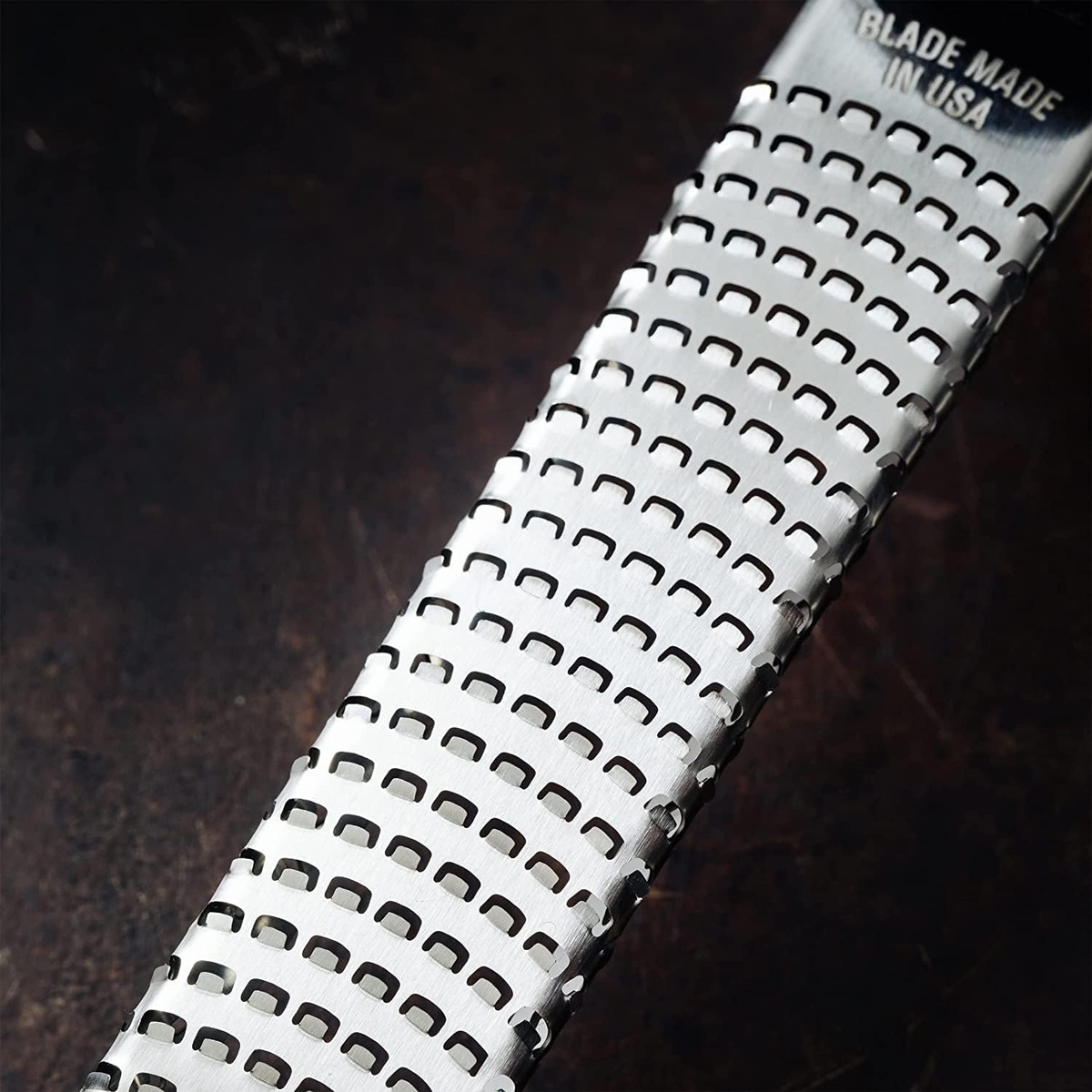 Close up detail of the ultra sharp photo etched stainless steel blade