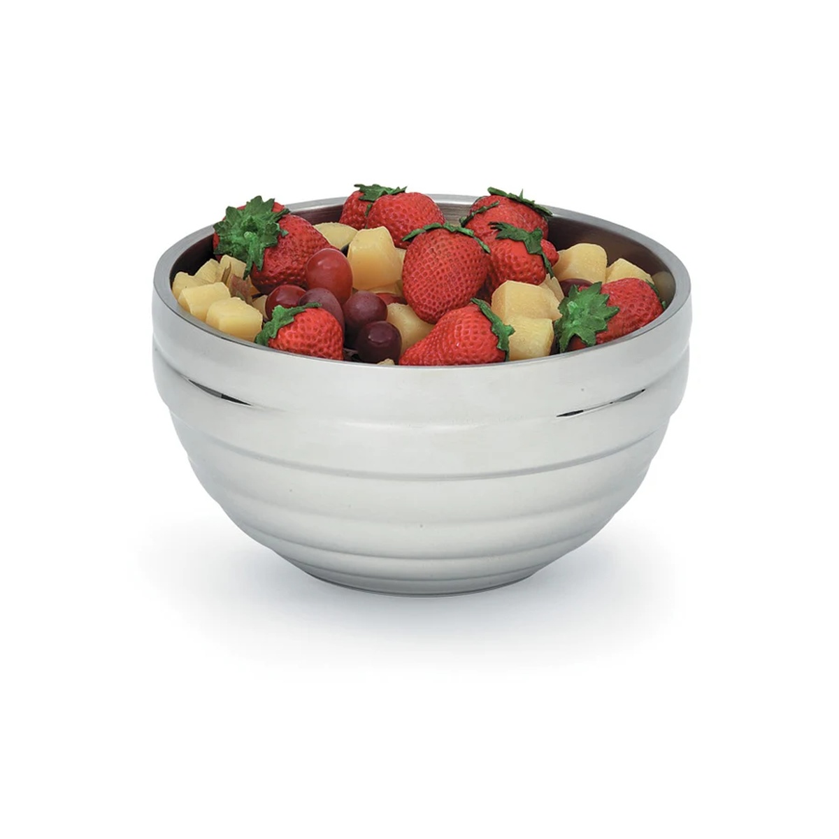 Vollrath 46591 stainless steel beehive serving bowl filled with fresh strawberries, grapes, and melon cubes
