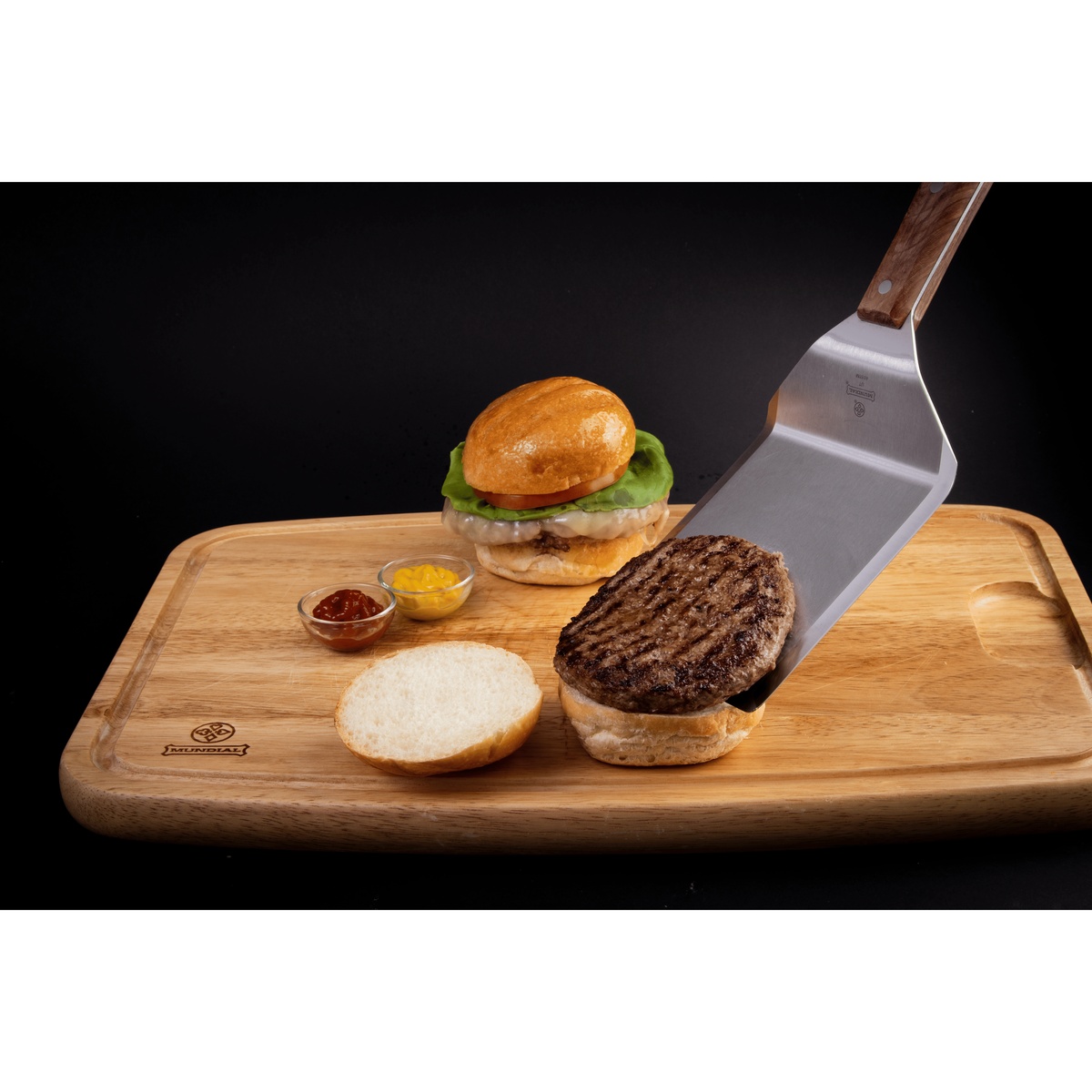 Mundial 4688M meat turner spatula blade close-up showing stainless steel finish