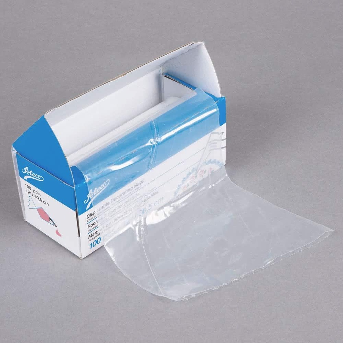 Ateco 4712 box of 100 clear disposable decorating bags on a roll, partially unrolled