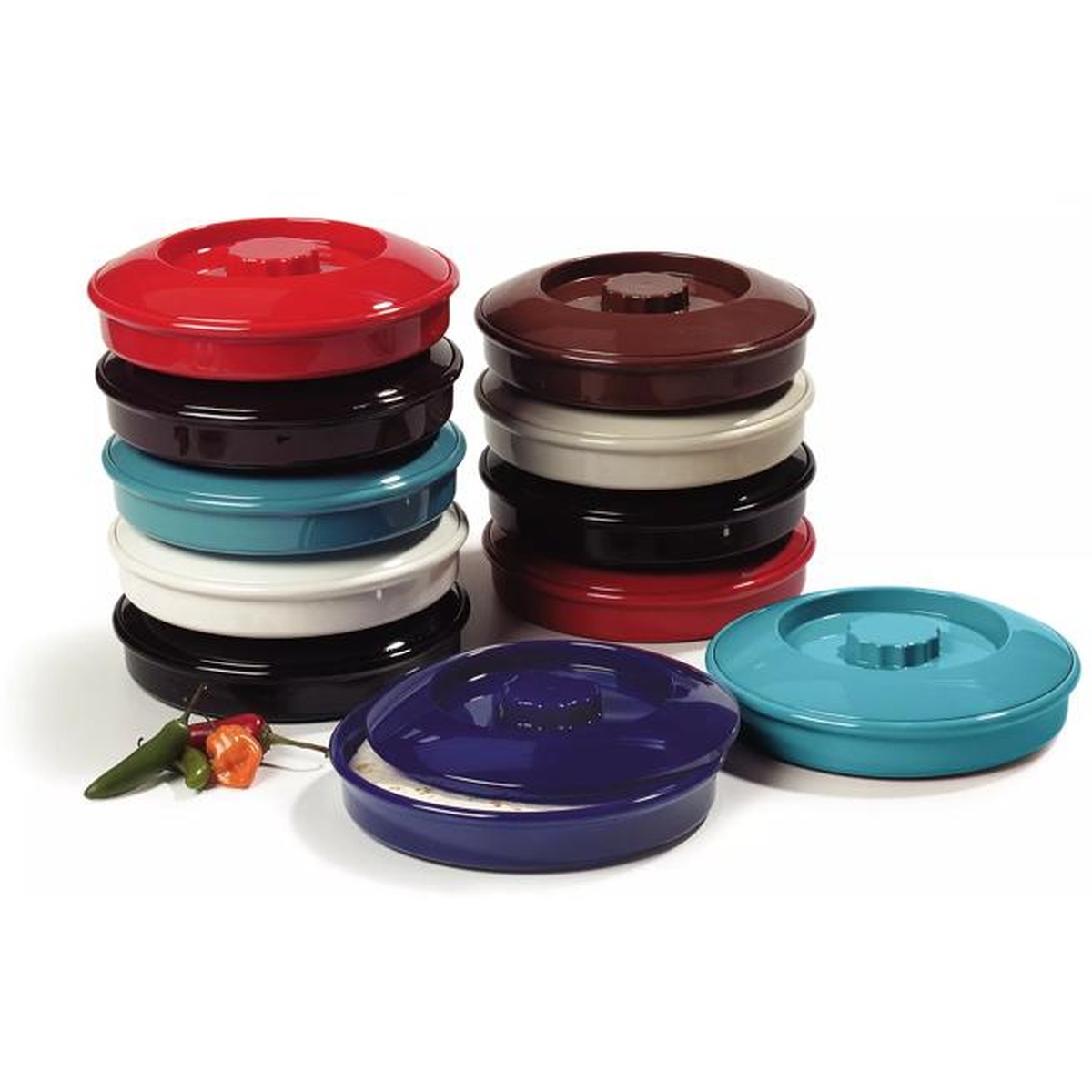 Multiple tortilla servers in assorted colors stacked in tall columns showing stackability