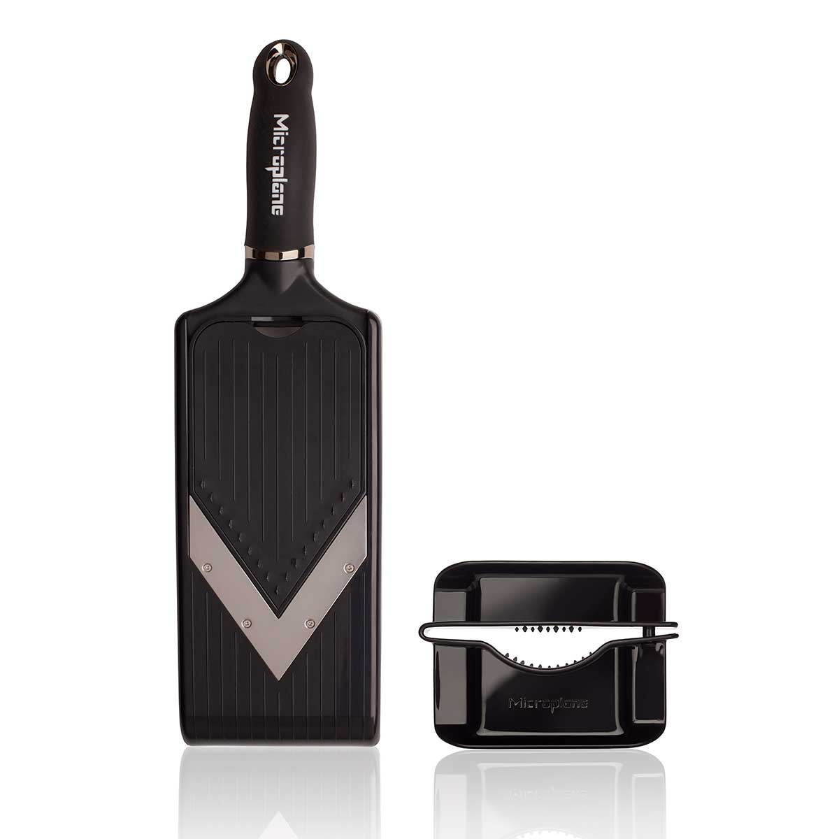 Microplane 48040 mandoline slicer shown alongside its separate food holder and hand guard accessory