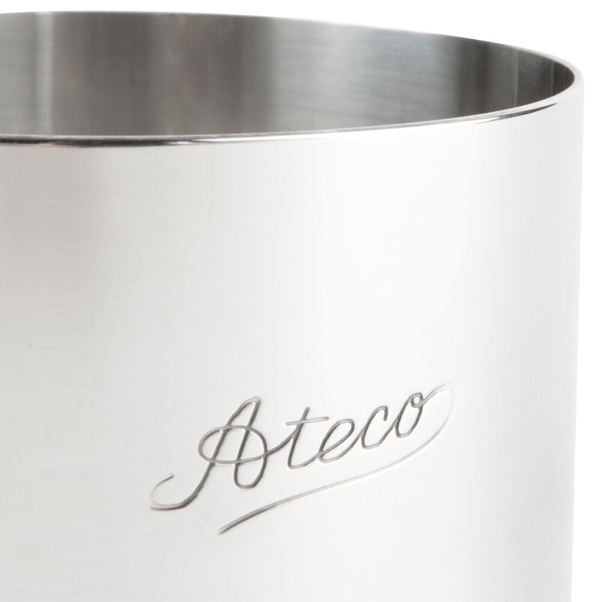 Close-up of the embossed Ateco script logo on the polished stainless steel surface of the round mold