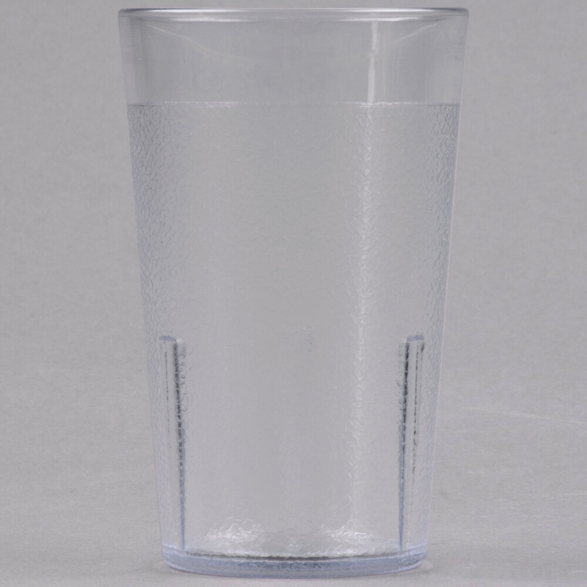 Cambro 500P152 clear 5.2 oz. SAN plastic tumbler with textured exterior and interior stacking lugs