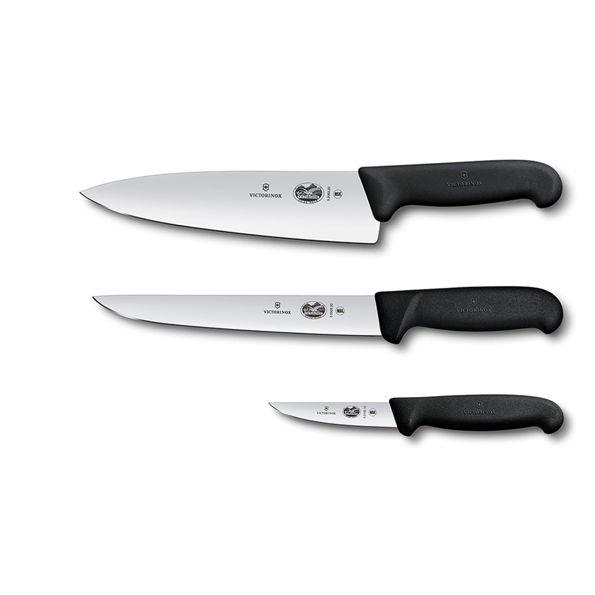 Victorinox 3-piece knife set laid out horizontally showing the chef, carving, and paring knives with stainless steel blades and black handles