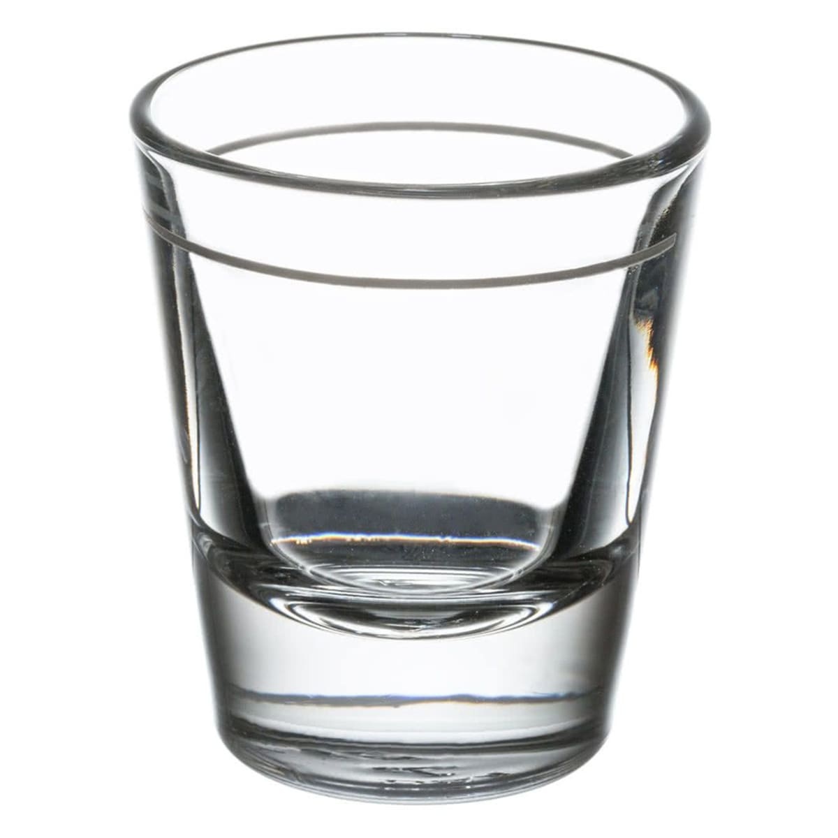 Libbey 5120/A0007 clear 1.5 oz whiskey shot glass with thick base and tapered body on white background