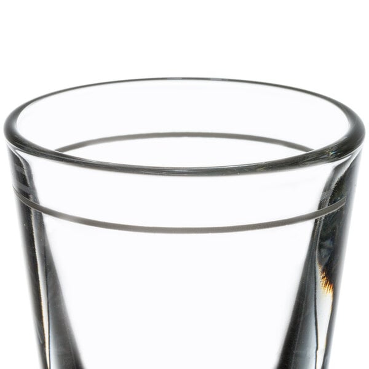 Close-up of Libbey 5120/A0007 shot glass rim and engraved 1 oz cap pour line near the top of the glass
