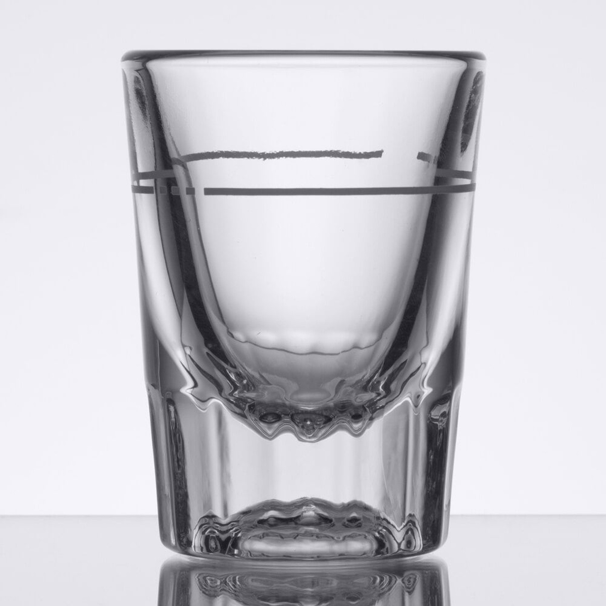 Libbey 5126/S0711 2 oz fluted whiskey shot glass showing thick fluted base and dual pour lines