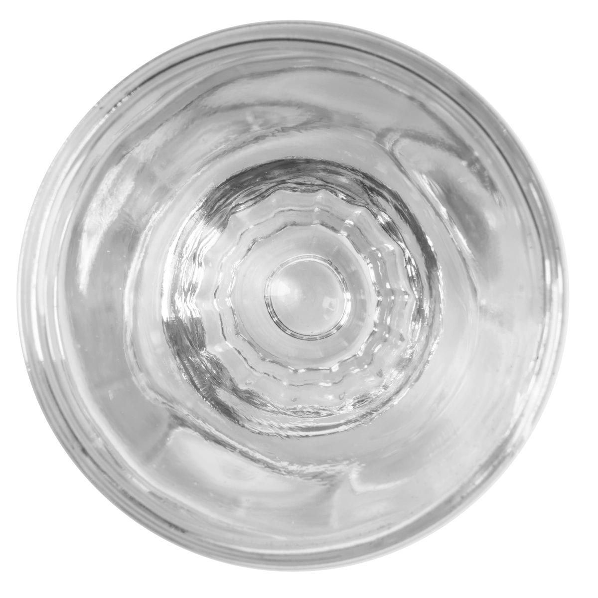 Libbey 5138 tall whiskey shot glass viewed from directly above, showing the concentric fluted interior pattern