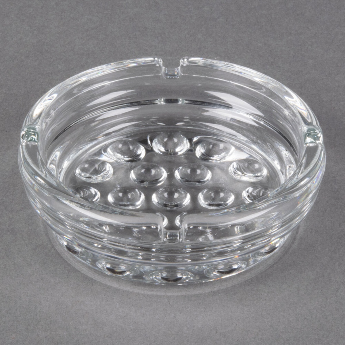 Libbey 5154 Nob Hill 4-inch round clear glass ashtray with decorative dotted base and four cigarette notches