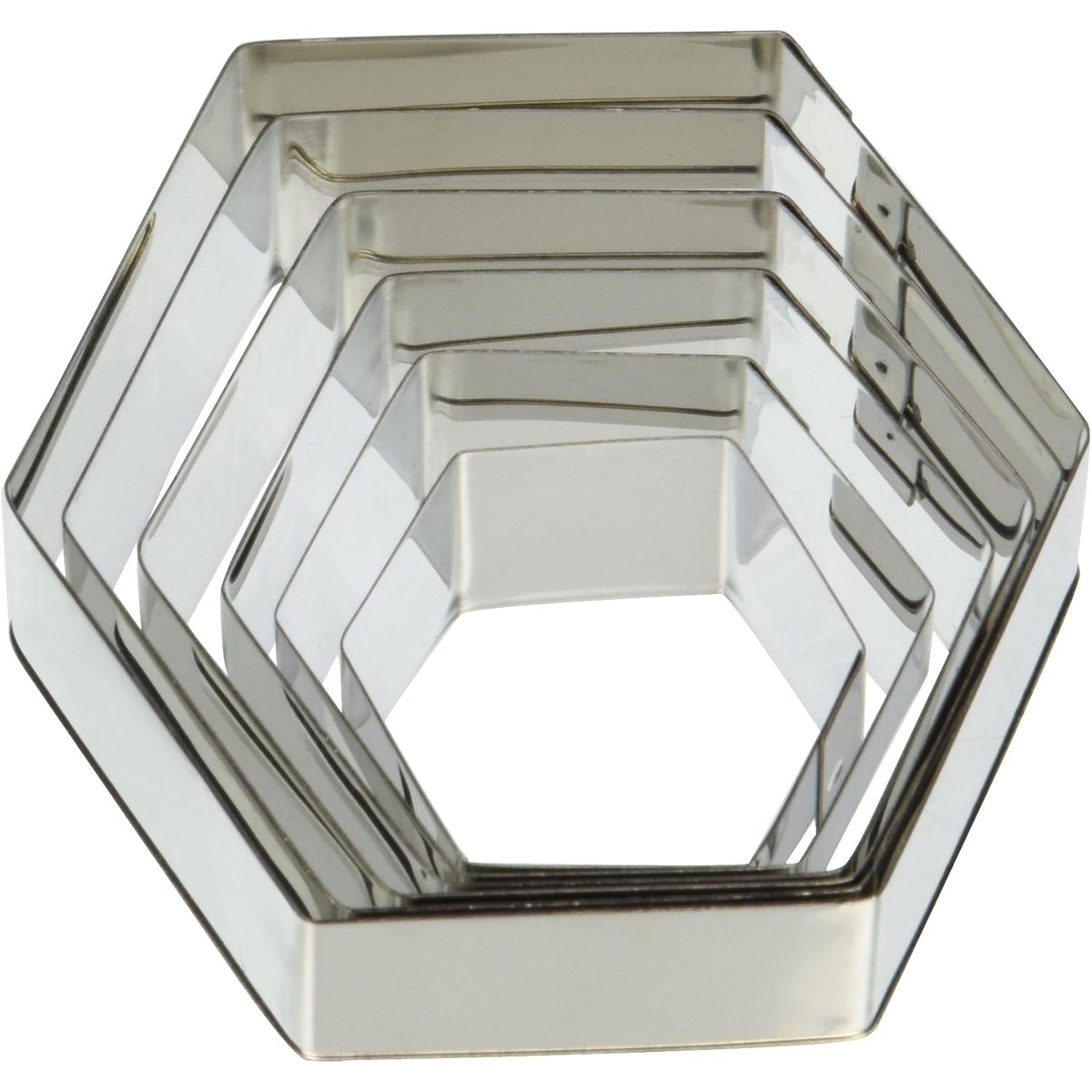 Six stainless steel hexagon cookie cutters nested together showing compact stackable storage