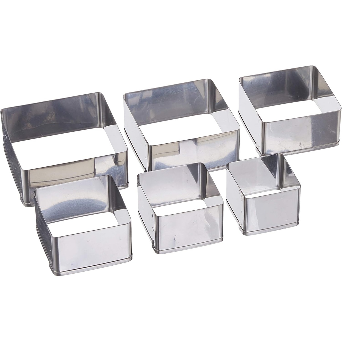 Six polished stainless steel plain-edge square cookie cutters in graduated sizes displayed at an angle