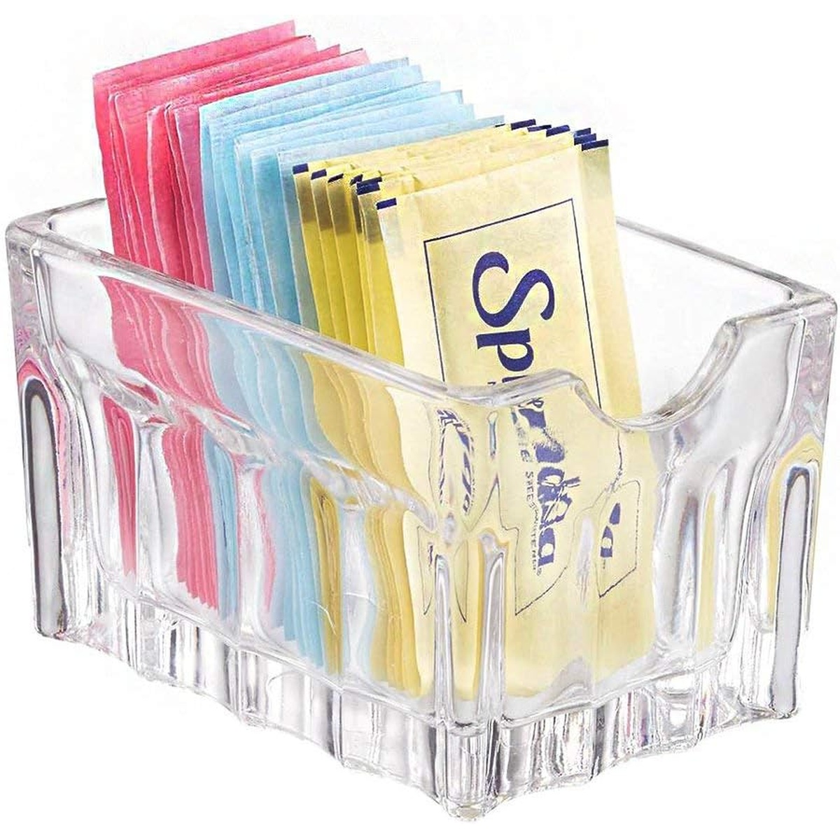 Libbey 5258 Gibraltar clear glass sugar packet holder filled with pink, blue, and yellow sweetener packets on white background