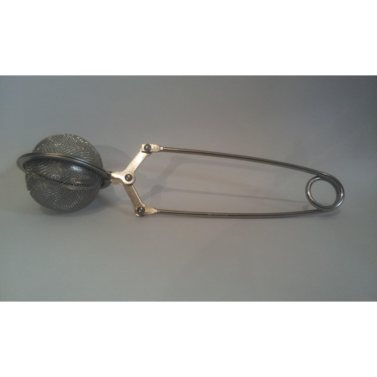 Norpro 5500D stainless steel mesh tea ball infuser with squeeze handle and loop end