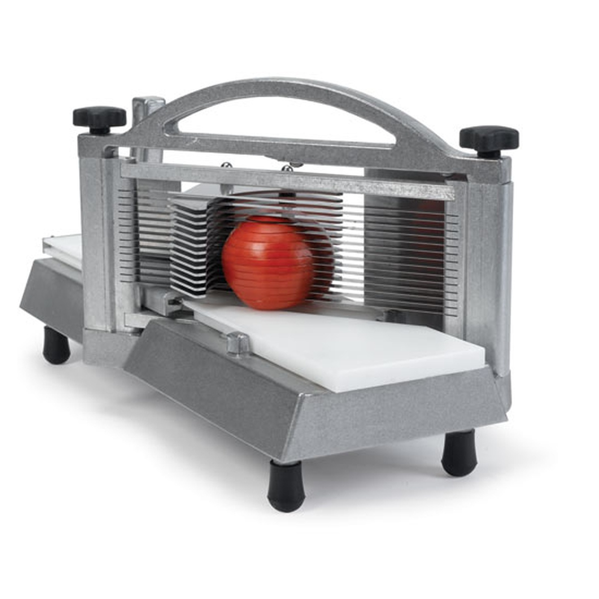 Nemco Easy Tomato Slicer 2 with tomato positioned in razor-sharp blades, showing 3/8 inch slicing mechanism and polyethylene slide board
