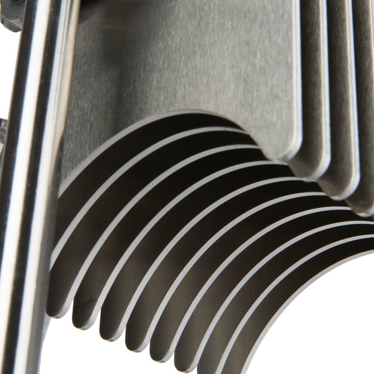 Close-up of scalloped stainless steel blade assembly