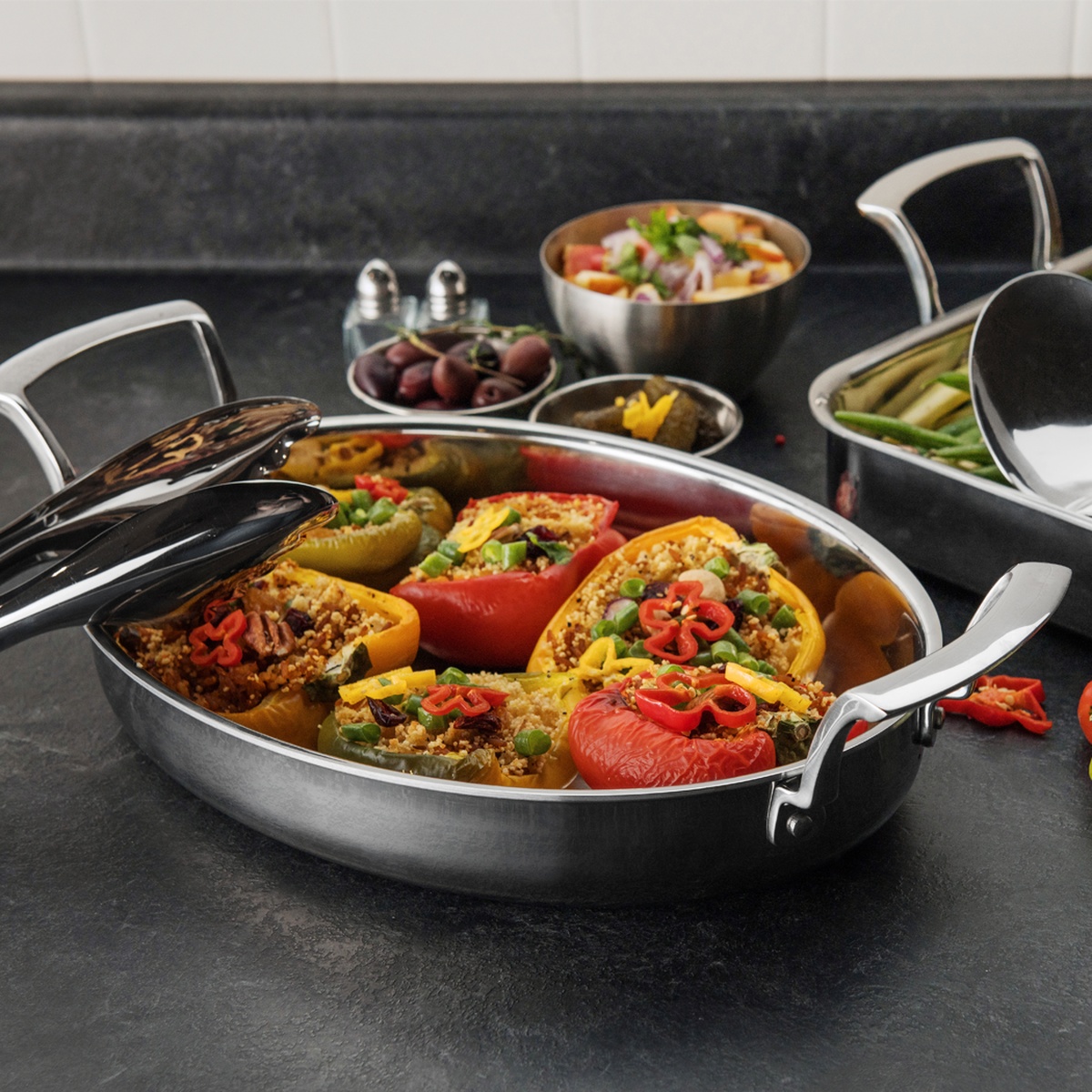 Browne Thermalloy oval roast pan side profile showing polished natural finish