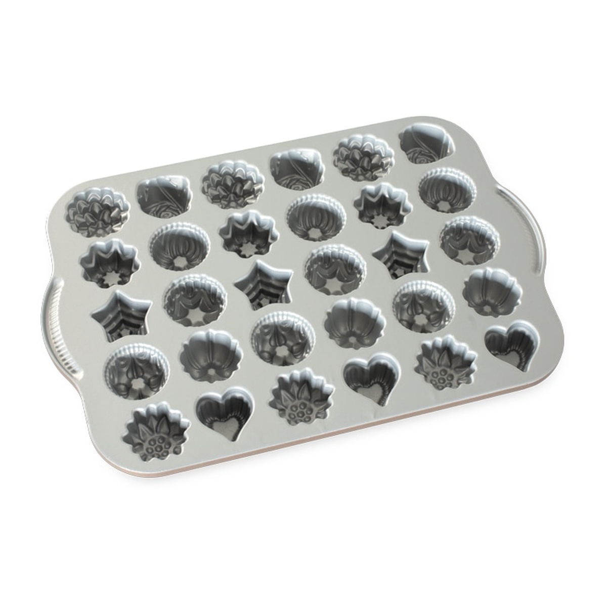 Interior view of Nordic Ware Bundt Tea Cakes and Candies Pan showing detailed silver nonstick cavities with varied floral and heart shapes