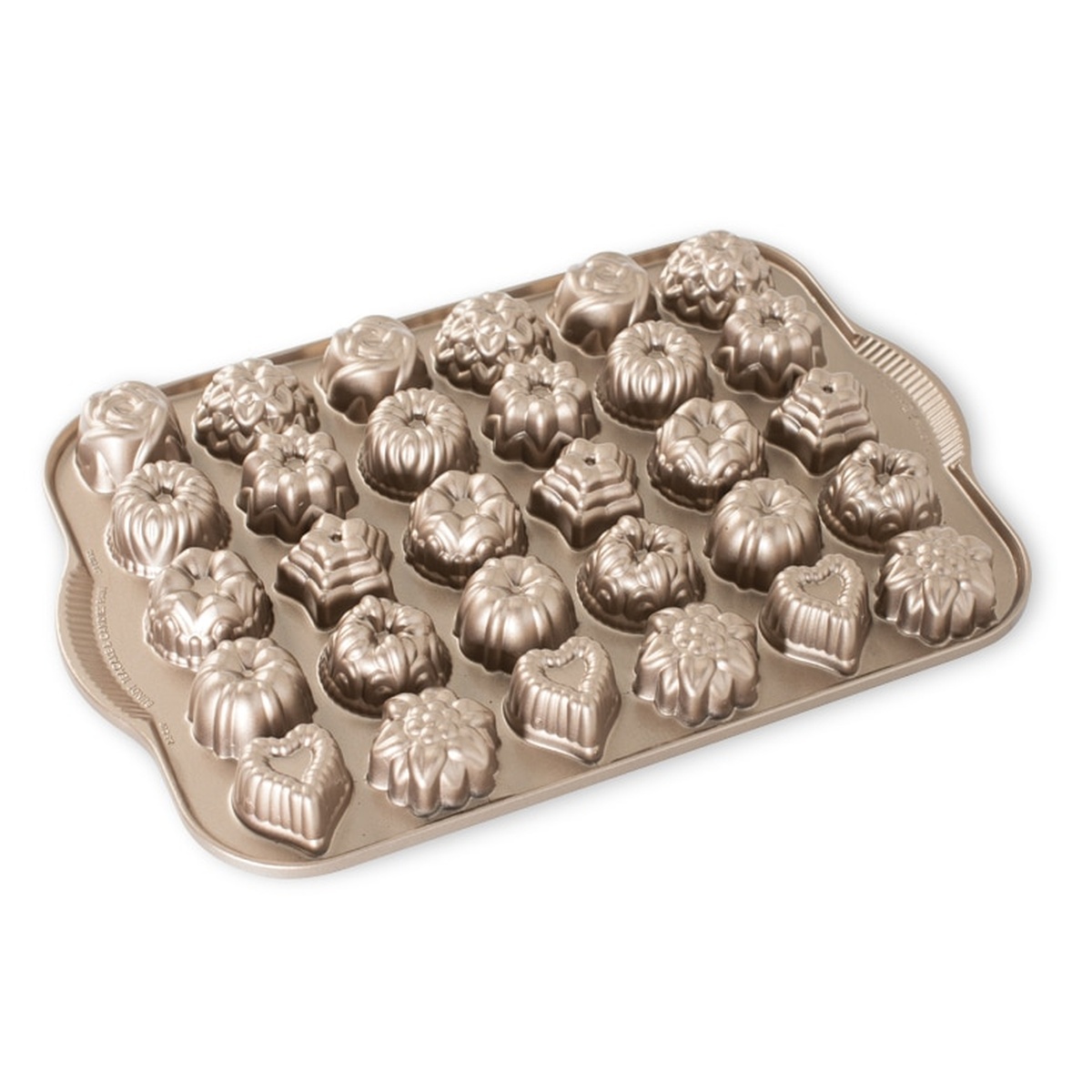 Nordic Ware Bundt Tea Cakes and Candies Pan showing 30 intricate miniature mold cavities in toffee-gold cast aluminum