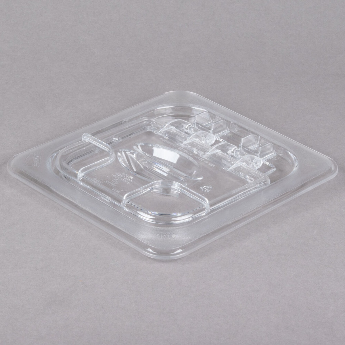 Cambro 60CWL135 clear polycarbonate 1/6 size FlipLid with hinged panel and molded handle, angled top view on neutral background