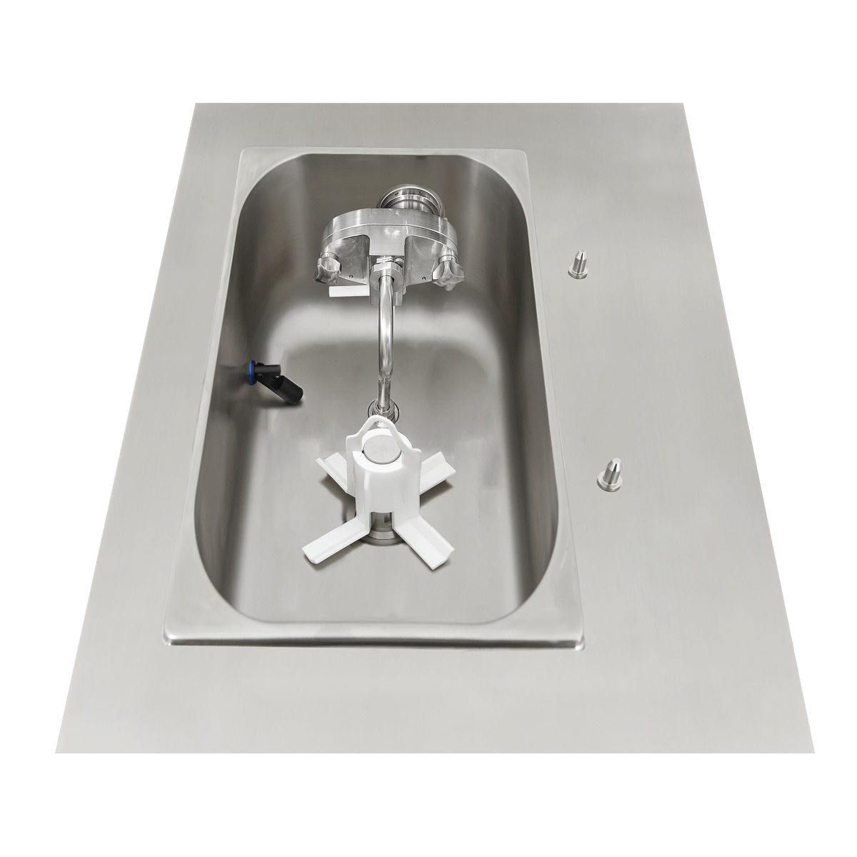 Top-down view of refrigerated hopper interior with agitator assembly