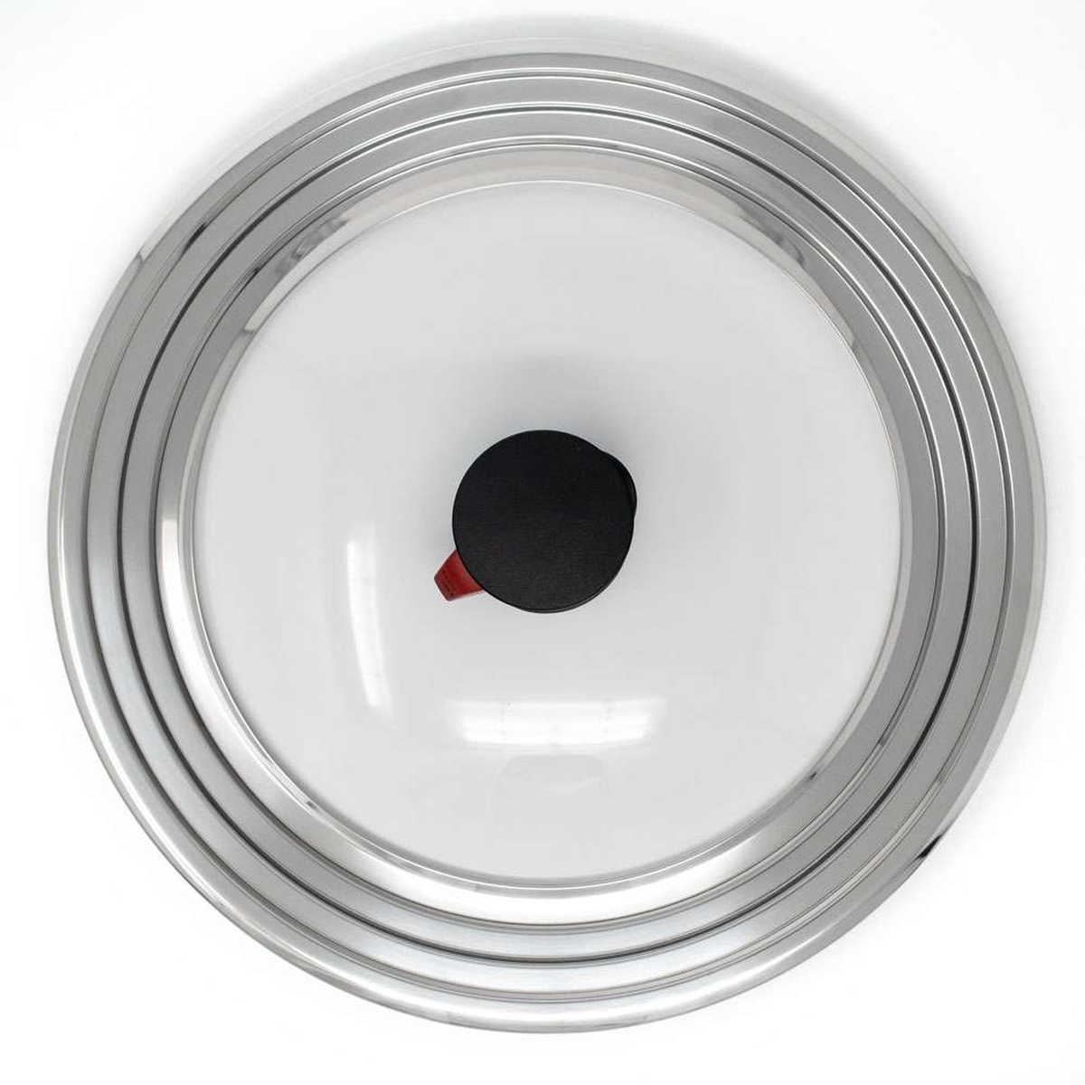Top-down overhead view of Norpro Smart Universal Lid showing concentric stainless steel rings and central valve knob