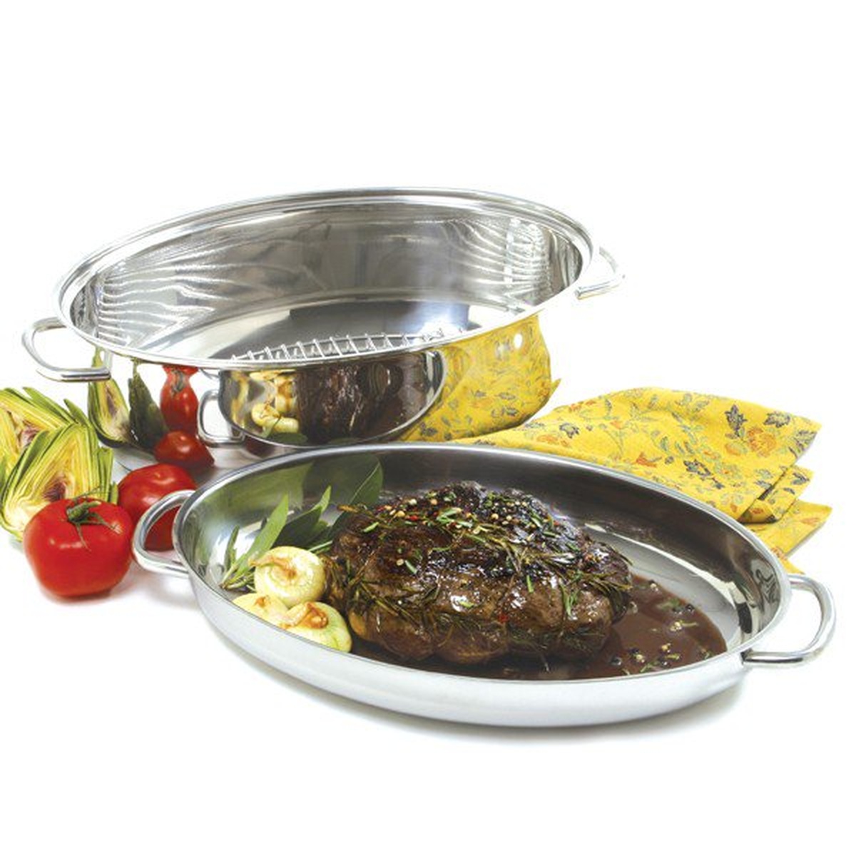 Norpro Krona stainless steel roaster with lid used as a shallow saute pan alongside roasting base