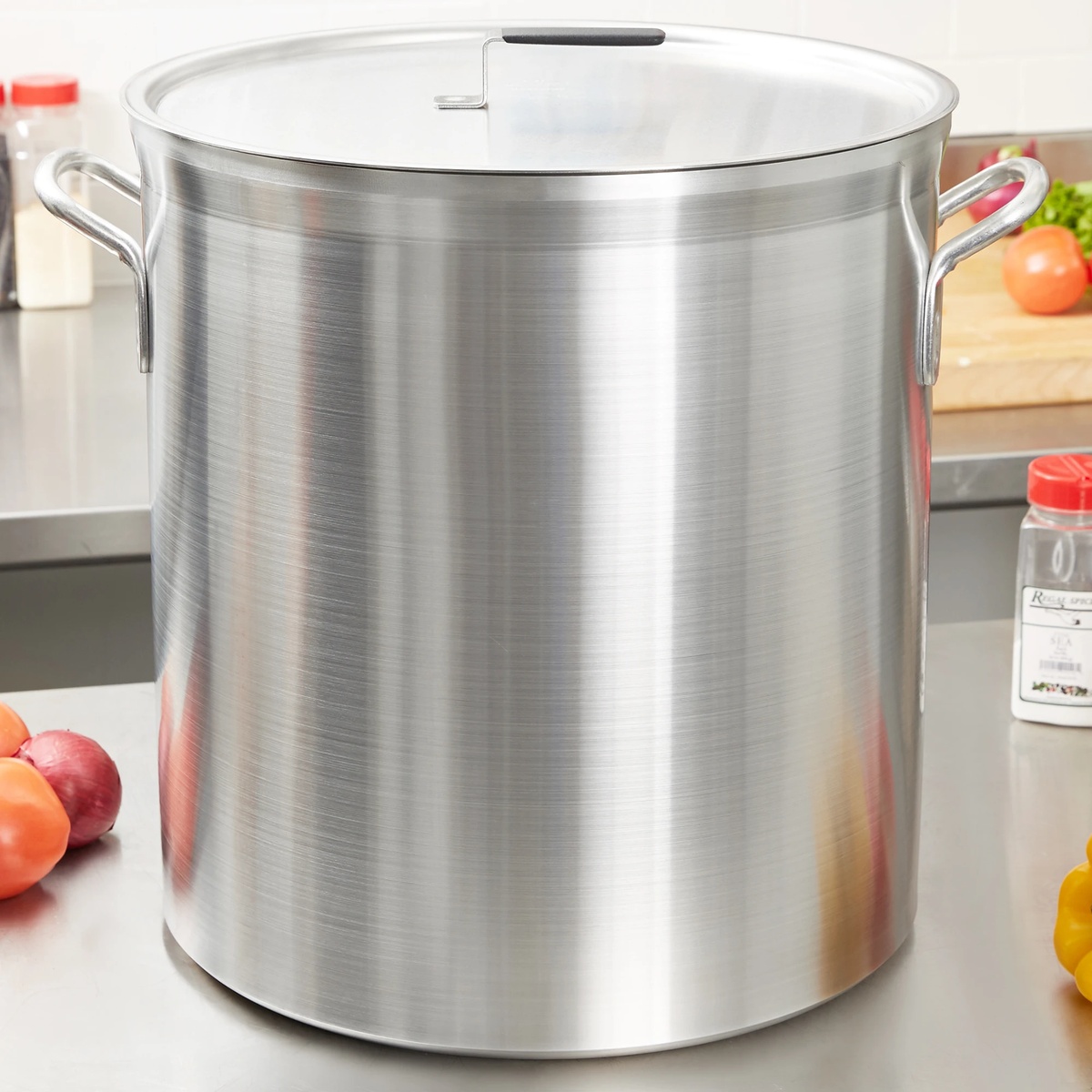 Vollrath stock pot in a commercial kitchen setting with lid