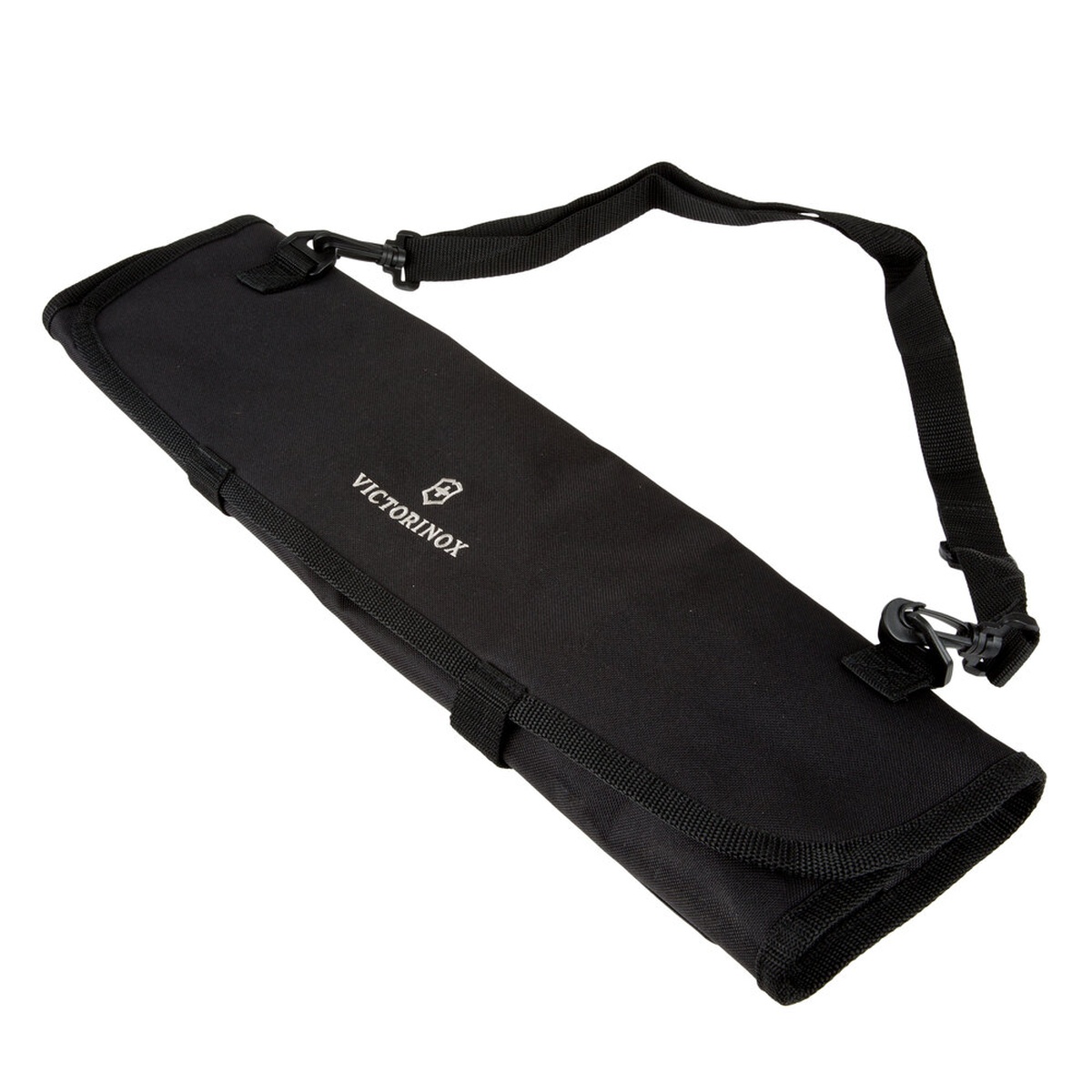 Victorinox 7.4012.3 black polyester tri-fold knife roll shown rolled up with shoulder strap attached
