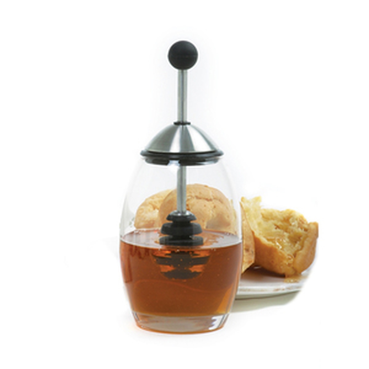 Norpro 782 Silicone Honey Dipper Set with glass jar filled with honey and a stainless steel adjustable handle