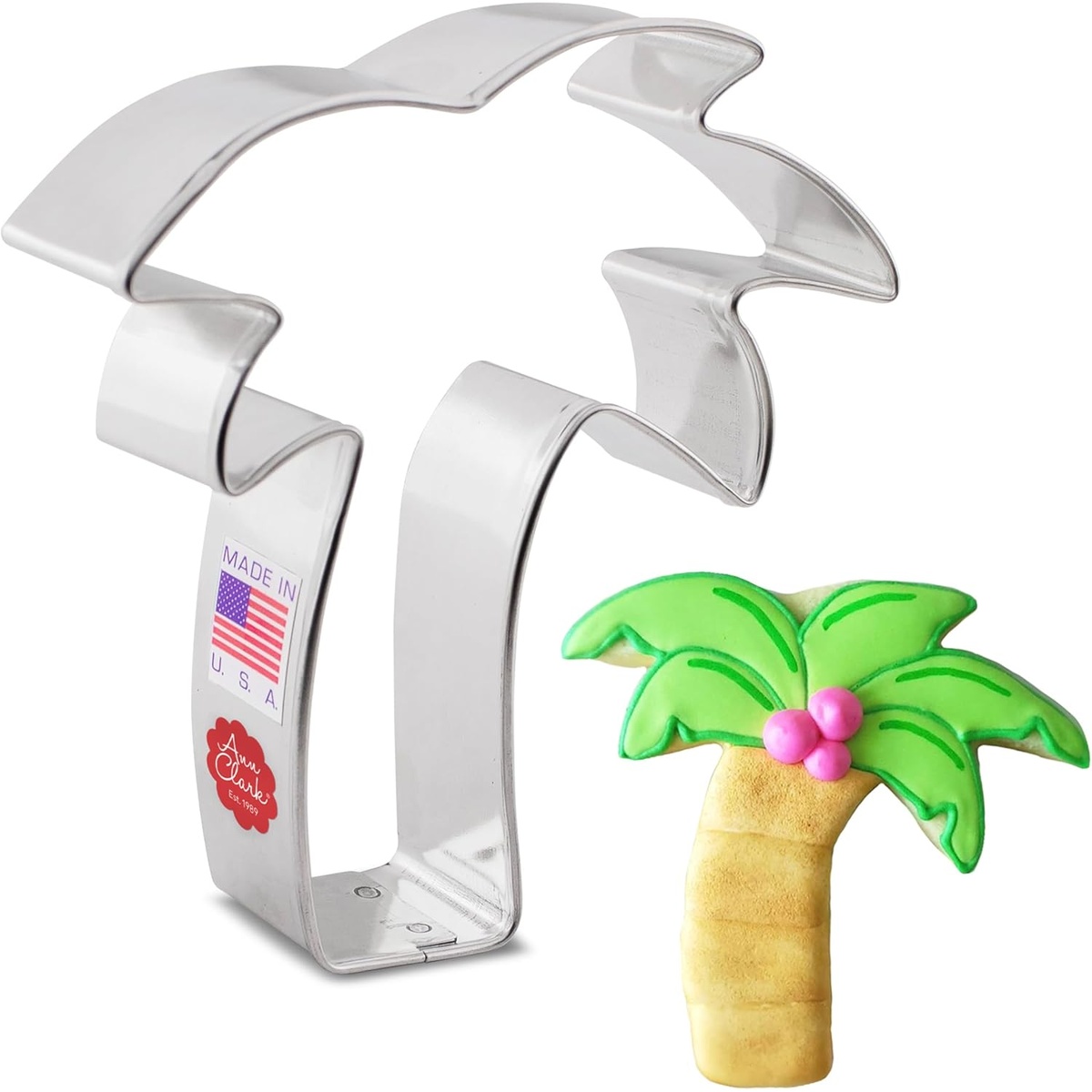 Ann Clark Palm Tree cookie cutter in alloy steel shown alongside a finished decorated palm tree cookie
