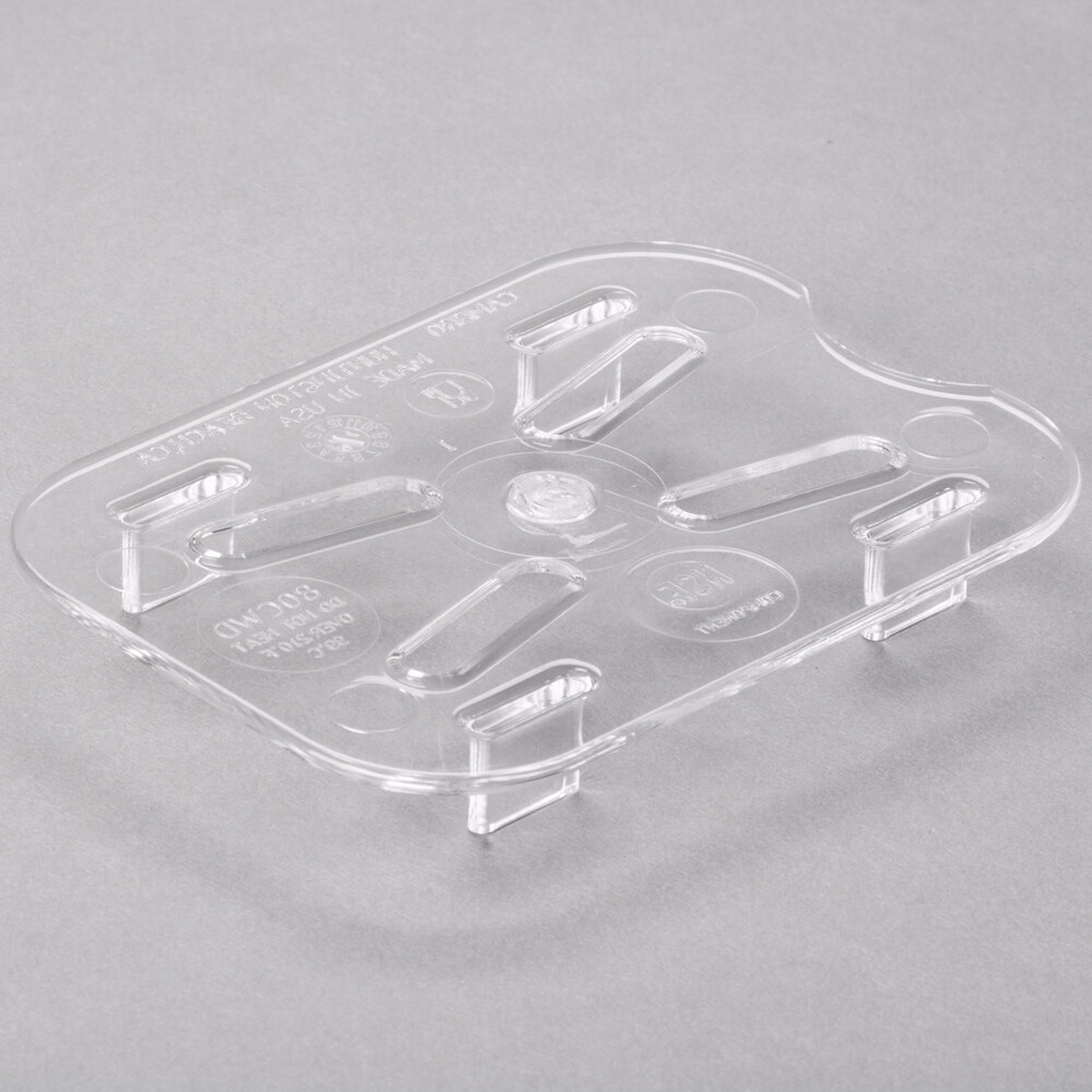 Cambro 80CWD135 clear polycarbonate 1/8 size drain shelf showing drainage slots and raised feet