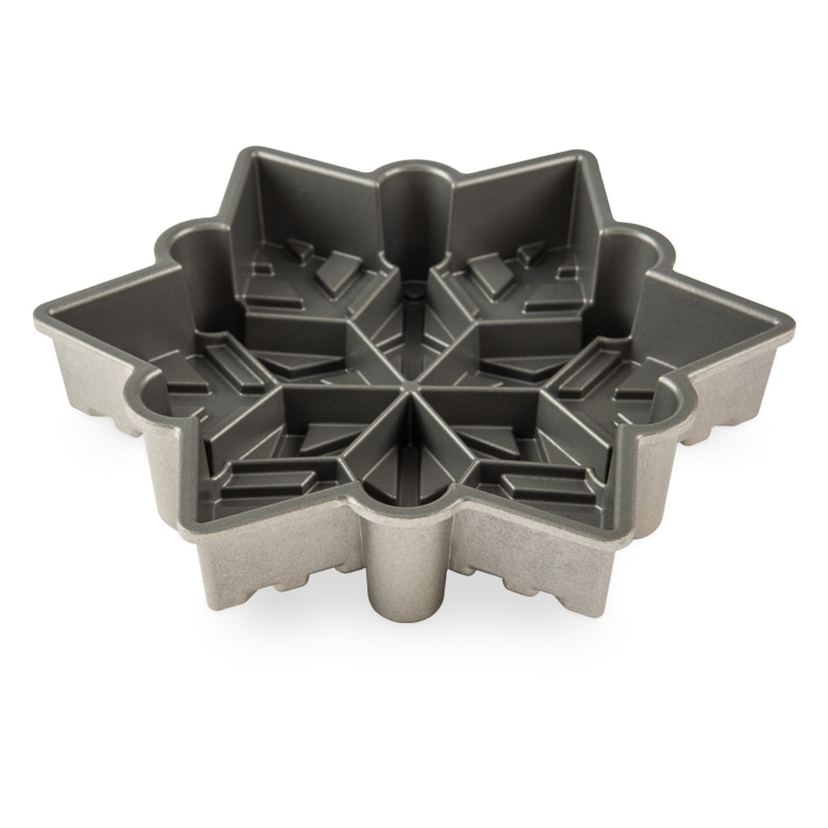 Nordic Ware Snowflake Pan interior view - dark nonstick coating lining the detailed snowflake-shaped cavity