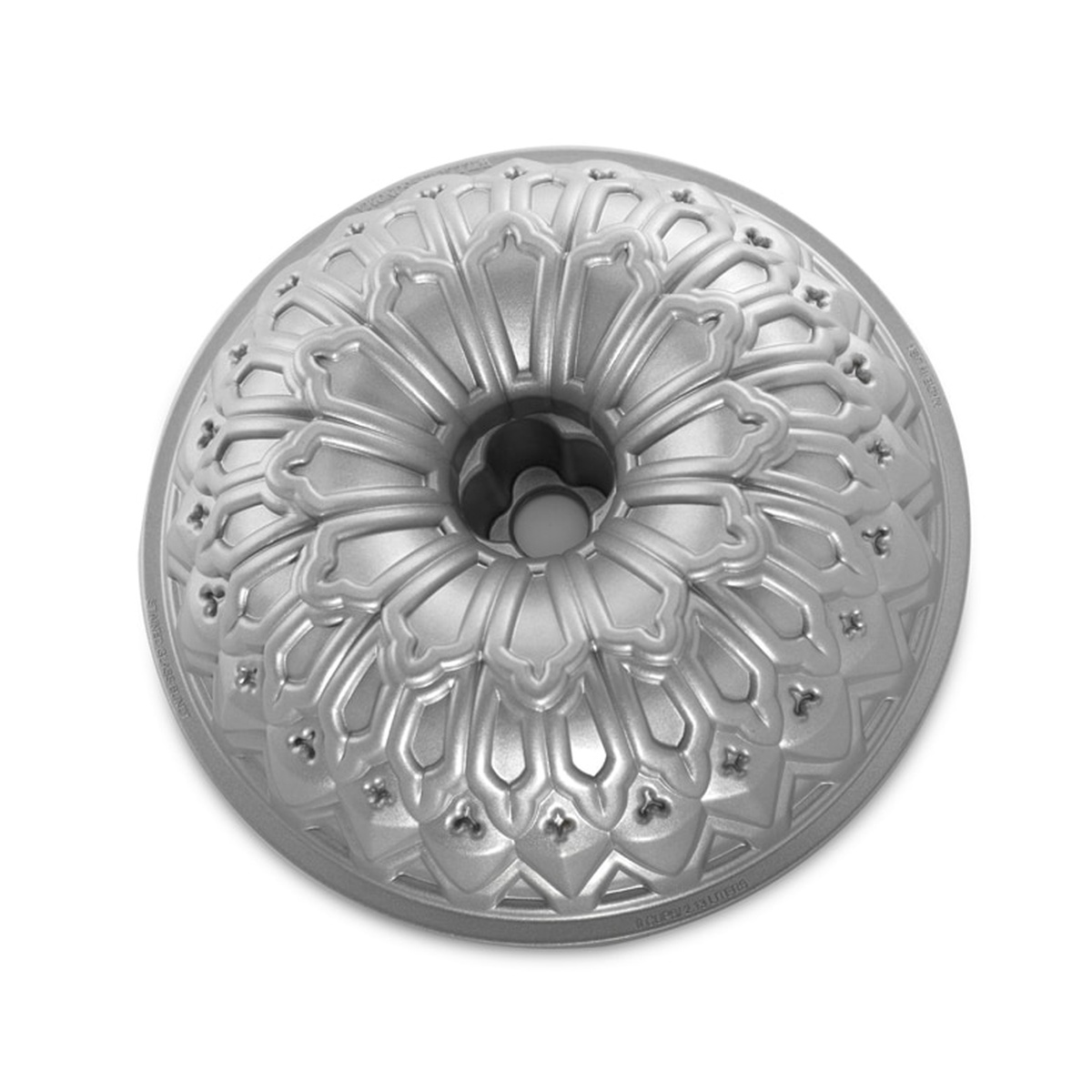 Nordic Ware Stained Glass Bundt Pan viewed from above, showing intricate geometric stained glass pattern in silver cast aluminum