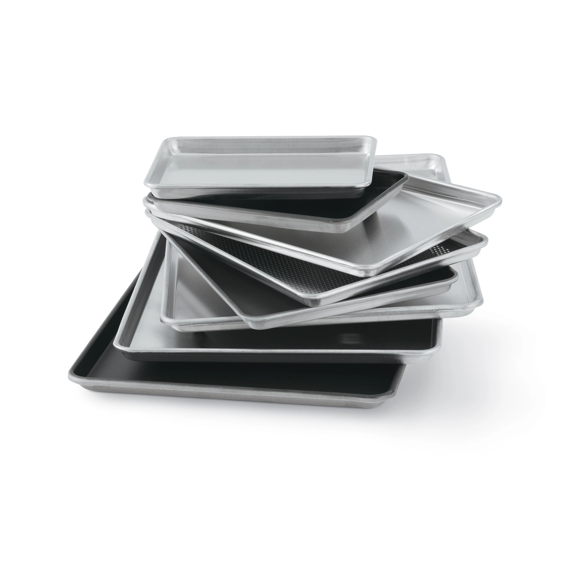 Multiple Vollrath Wear-Ever sheet pans of various sizes stacked together, showing tapered stacking design