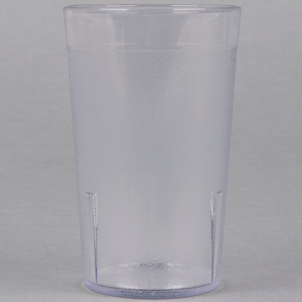 Cambro 950P152 9.8 oz. clear SAN plastic tumbler showing textured exterior and interior stacking lugs