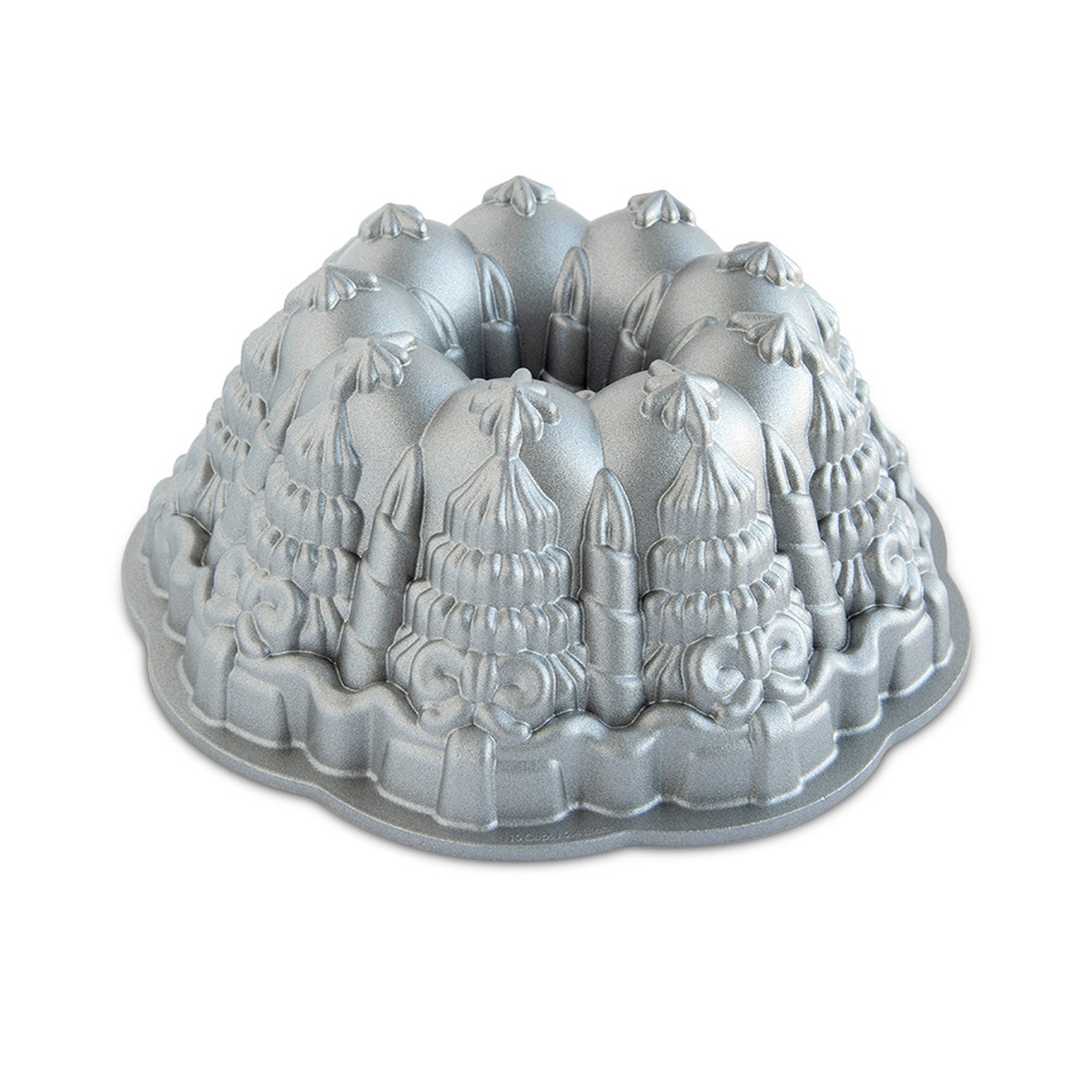 Nordic Ware Very Merry Bundt Pan exterior view showing detailed holiday tree, candle, and present relief patterns in sparkling silver cast aluminum