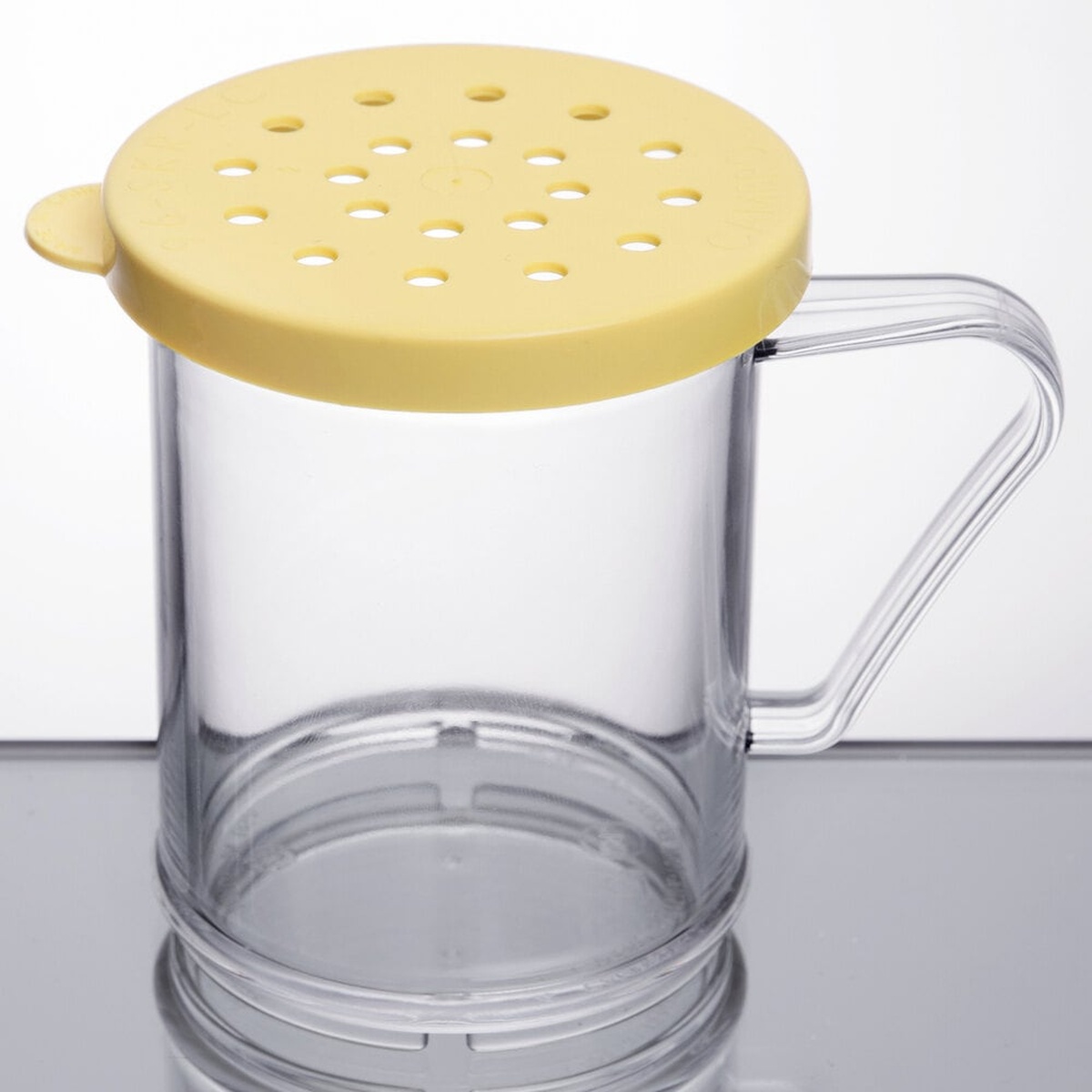Cambro 96SKRC135 clear polycarbonate shaker with yellow perforated cheese lid and side handle