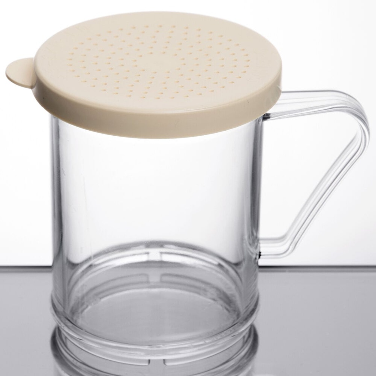 Cambro 96SKRD135 clear polycarbonate shaker with beige perforated lid and side handle