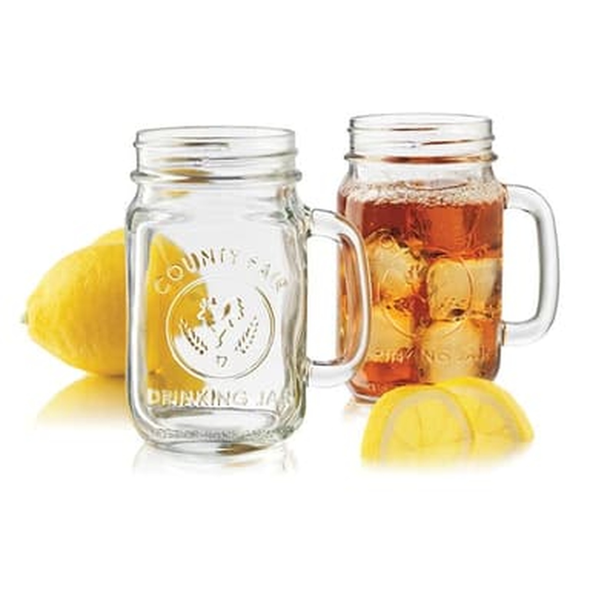 Two Libbey County Fair 16.5 oz drinking jars side by side -- one empty, one filled with iced tea