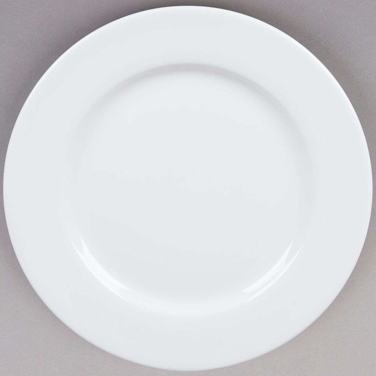 Tuxton ALA-104 Alaska 10-1/2 inch bright white wide rim rolled edge china plate, top-down view