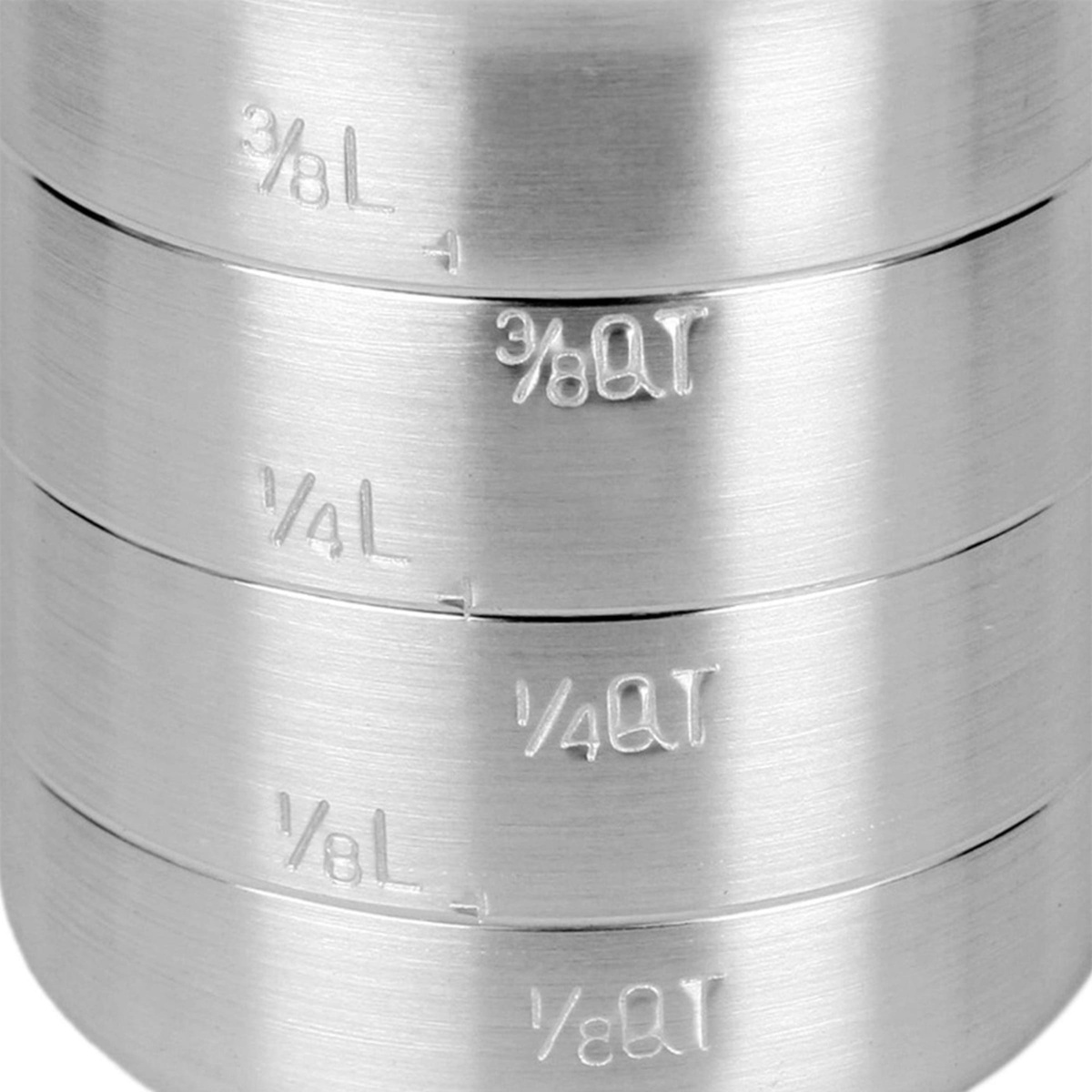 Close-up of embossed measurement markings on Thunder Group ALKAM005 aluminum measuring cup showing 1/8 QT, 1/4 QT, and 3/8 QT graduations