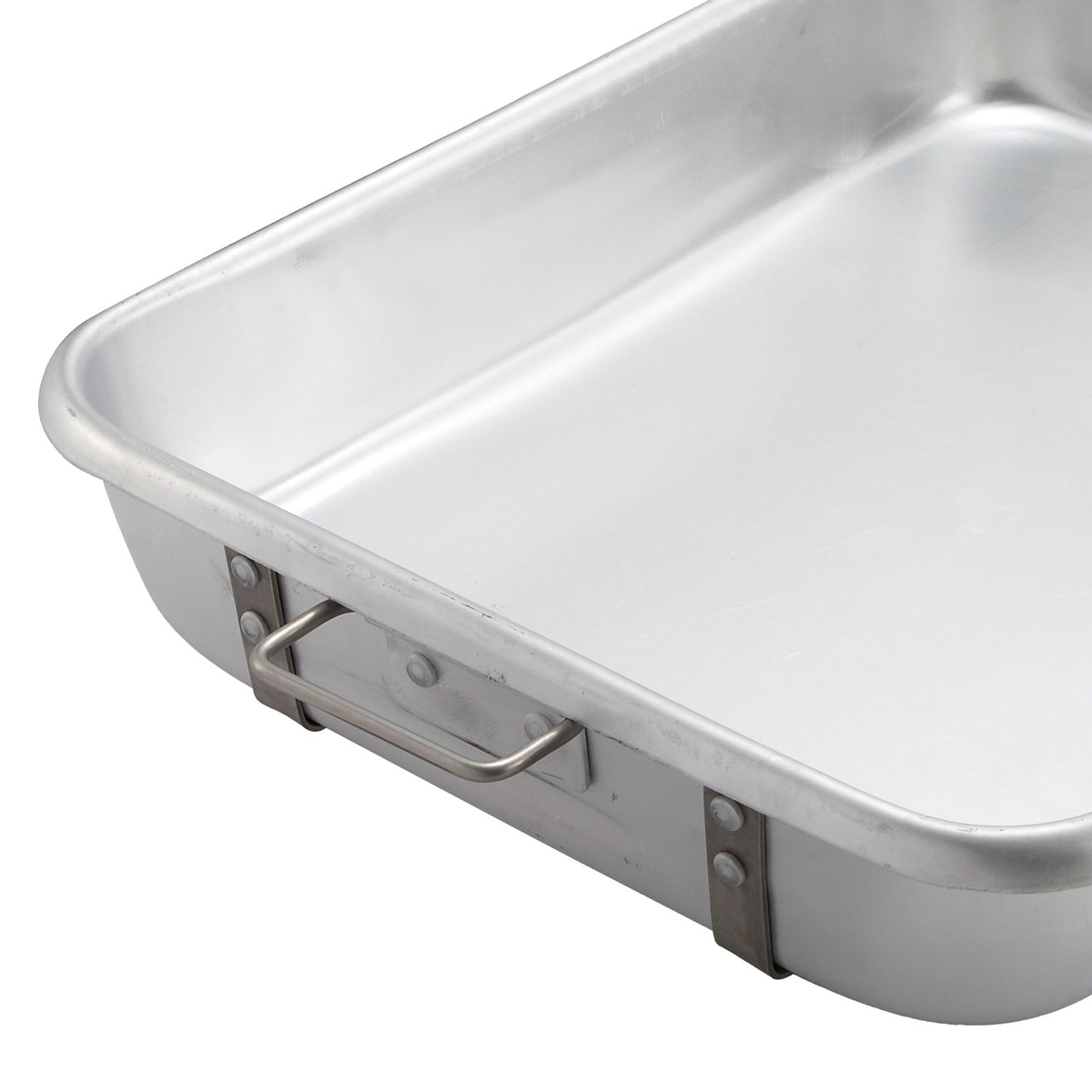 Close-up of the riveted handle and strap hardware on the Winco ALRP-1824 aluminum roasting pan