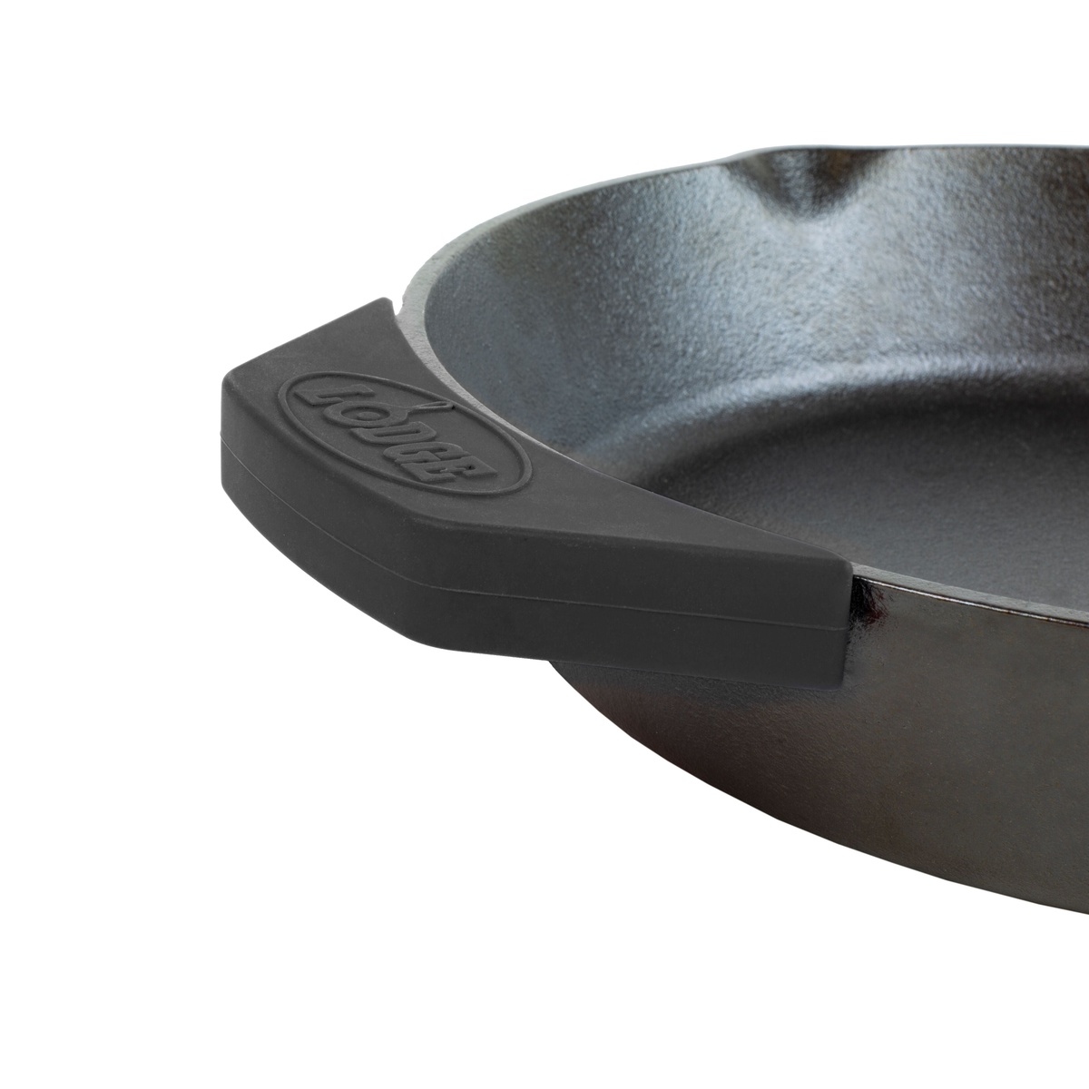 Black Lodge silicone assist handle holder fitted onto a cast iron skillet assist handle