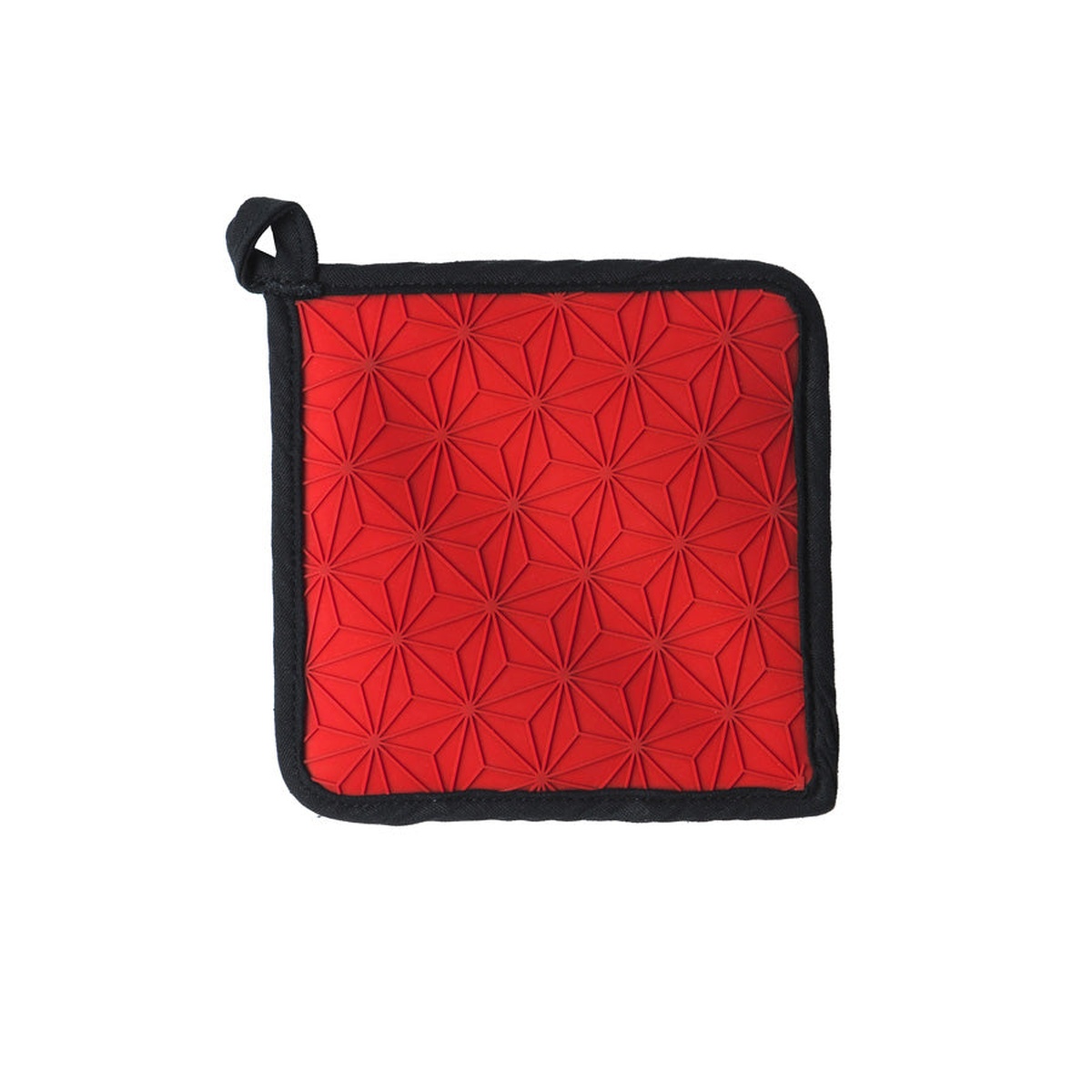 Close-up of Lodge pot holder showing embossed red silicone star pattern on exterior surface
