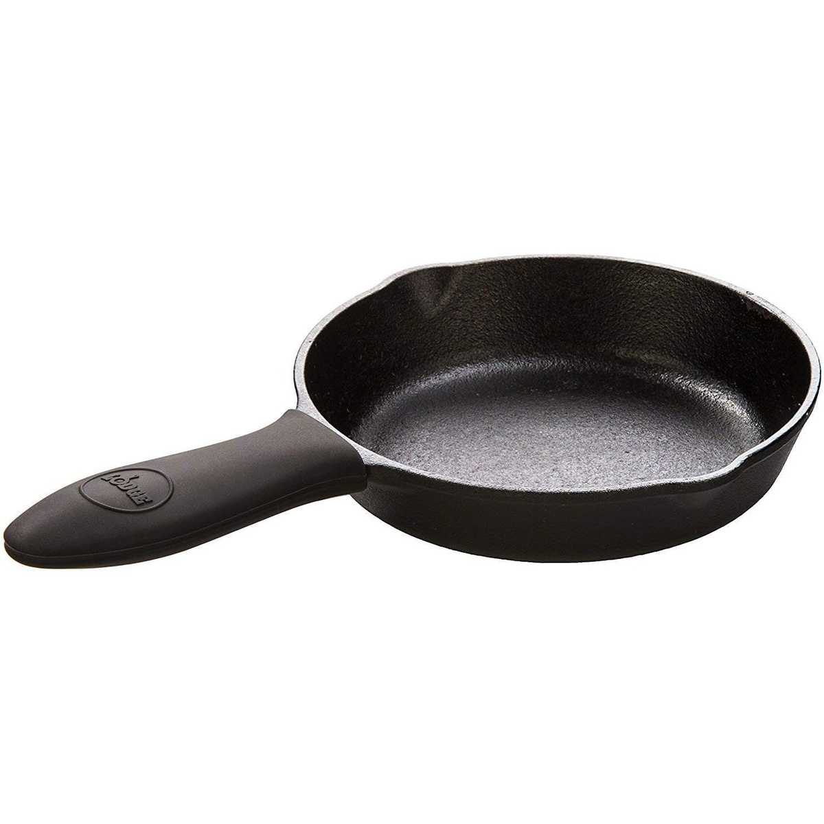Lodge silicone handle holder fitted onto the handle of a small cast iron skillet