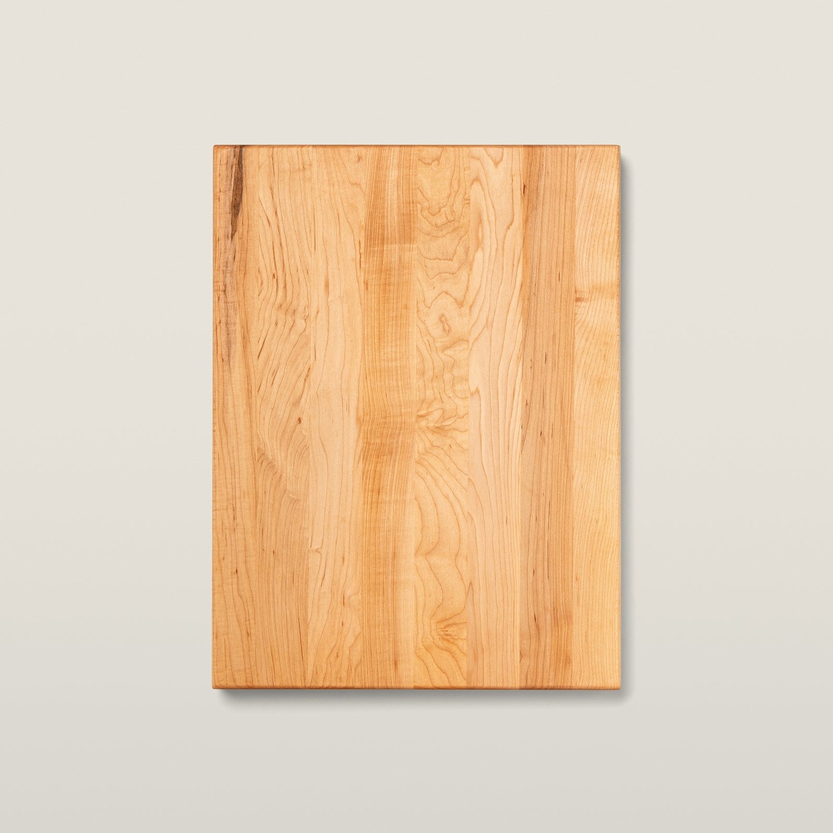 Flat bottom side of John Boos AuJus maple cutting board showing smooth reversible surface