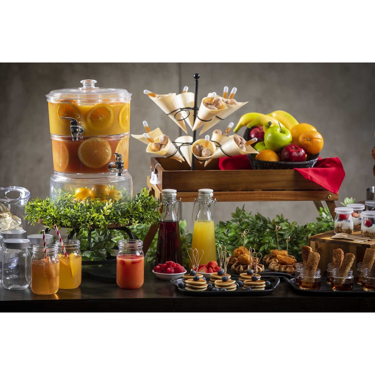 Full buffet spread featuring wooden cones and other disposable serving pieces
