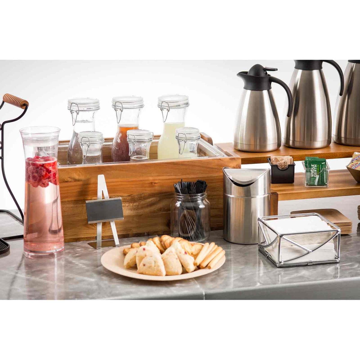 Bamboo plate used in a buffet setup with pastries and coffee service