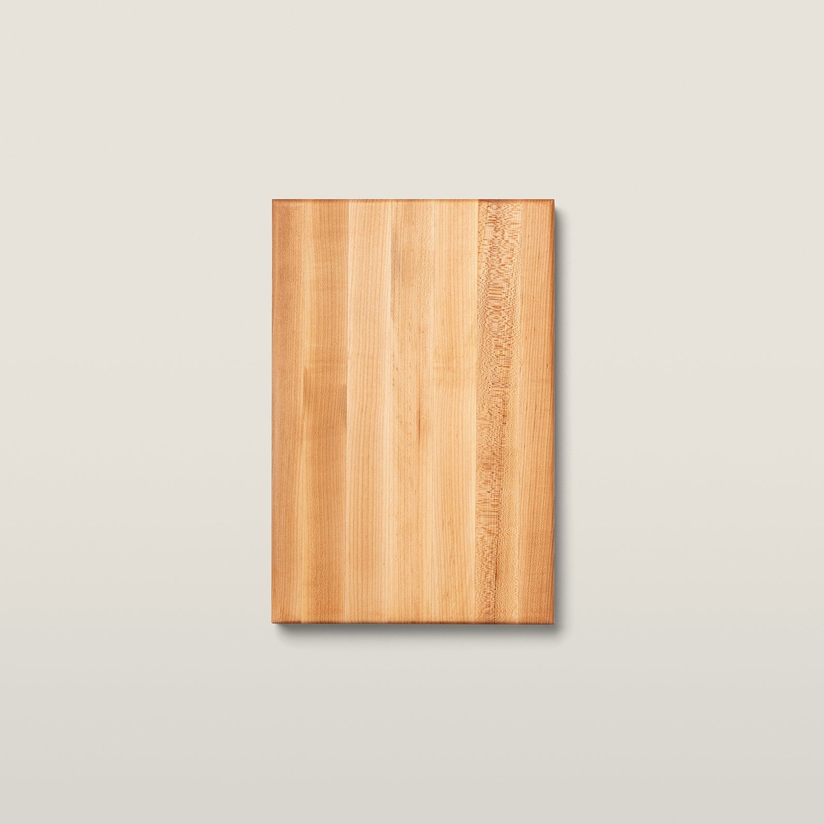 Top-down view of the flat reverse side of the John Boos BBQBD maple cutting board